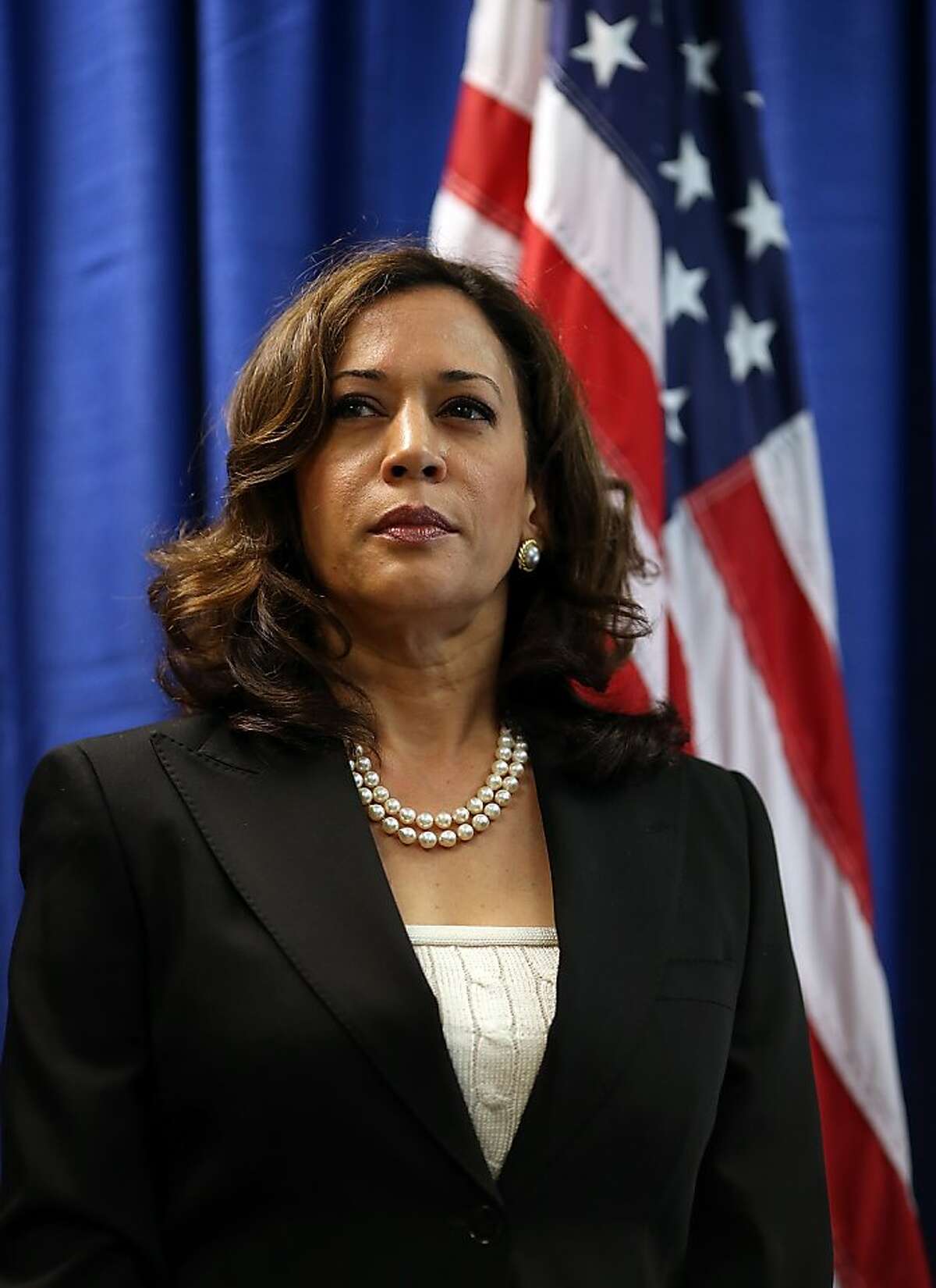 California Attorney General Kamala Harris looks on after California Governor Jerry Brown signed the California Homeowner Bill of Rights (AB 278 and SB 900) on July 11, 2012 in San Francisco, California. Gov. Jerry Brown signed the California Homeowners Bill of Rights that establishes landmark protection rules for mortgage loan borrowers. The laws go into effect on January 1, 2013. (Photo by Justin Sullivan/Getty Images)