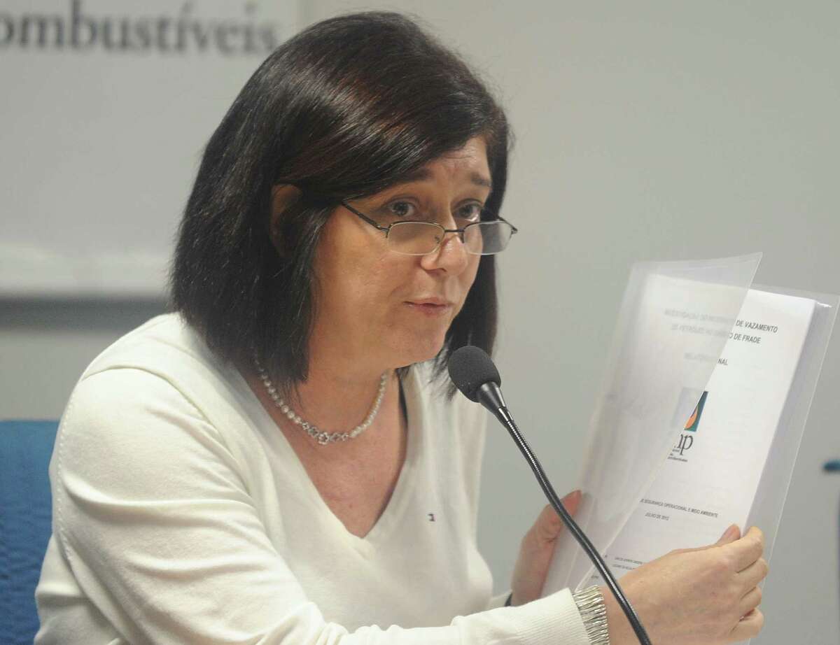 Magda Chambriard, Brazil's National Oil Agency president, shows the final report on the November 2011 Chevron platform oil spill occured at the Frade oilfield in the Atlantic Ocean in front of the Campos marine basin, some 300Km north of Rio de Janeiro, during a press conference in Rio de Janeiro, Brazil, on July 19, 2012. AFP PHOTO/ANTONIO SCORZAANTONIO SCORZA/AFP/GettyImages