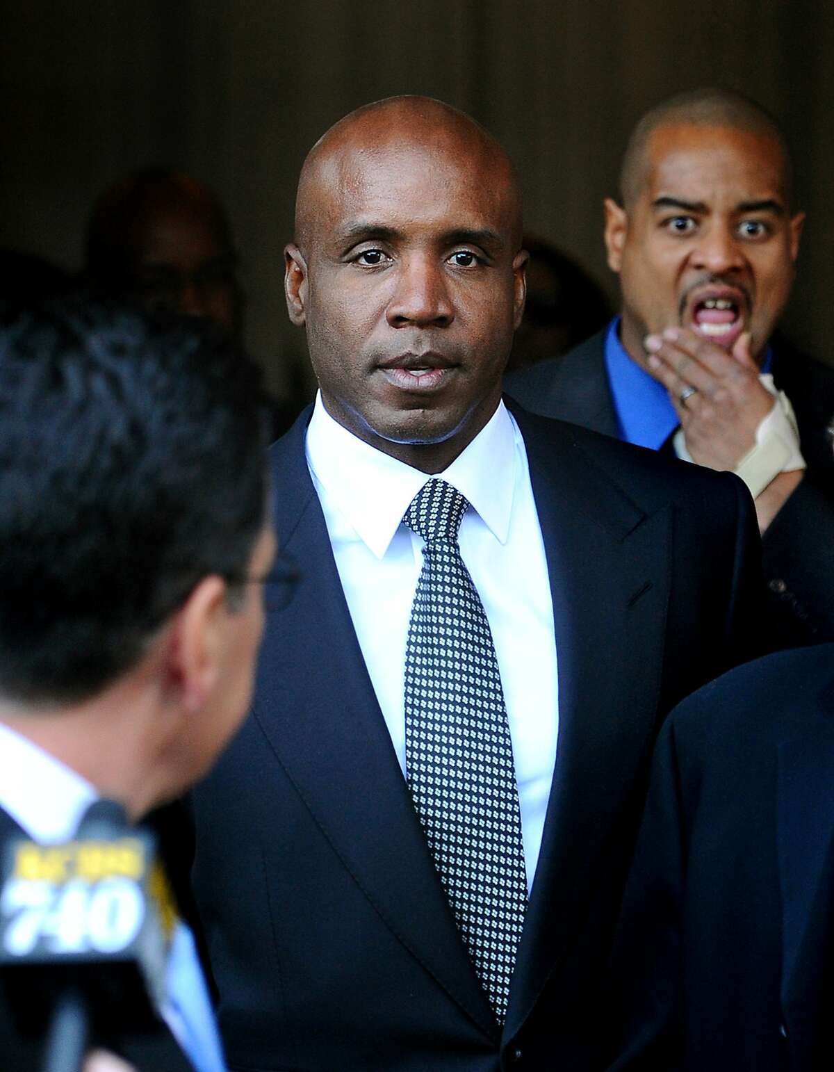 his Dec. 16, 2011 file photo shows former baseball player Barry Bonds leaving federal court after being sentenced for obstructing justice in a government steroids investigation, in San Francisco.