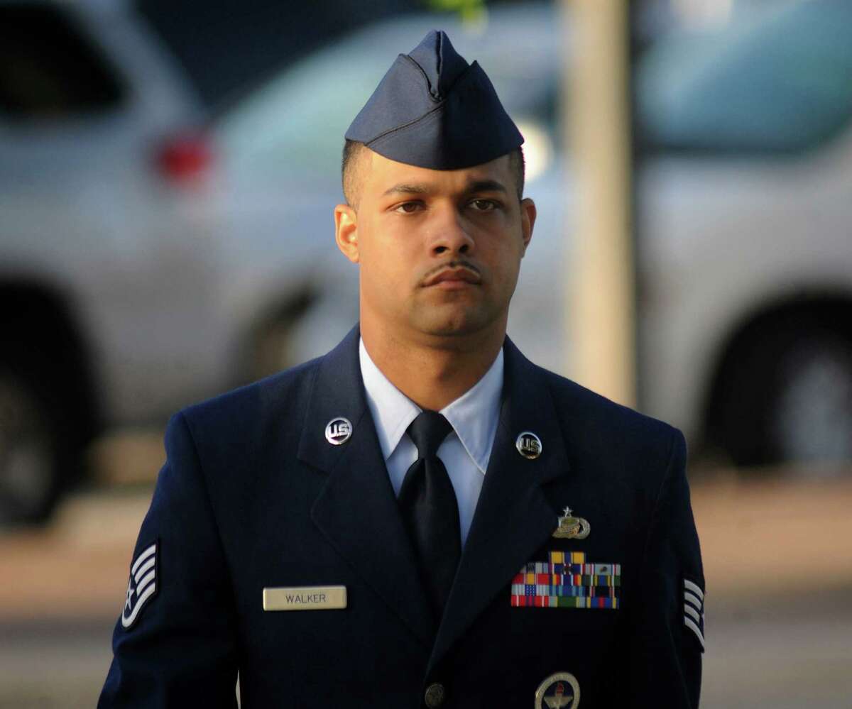 Air Force Staff Sgt. Luis Walker arrives for the fourth day of his trial at Joint Base San Antonio-Lackland on Friday, July 20, 2012.