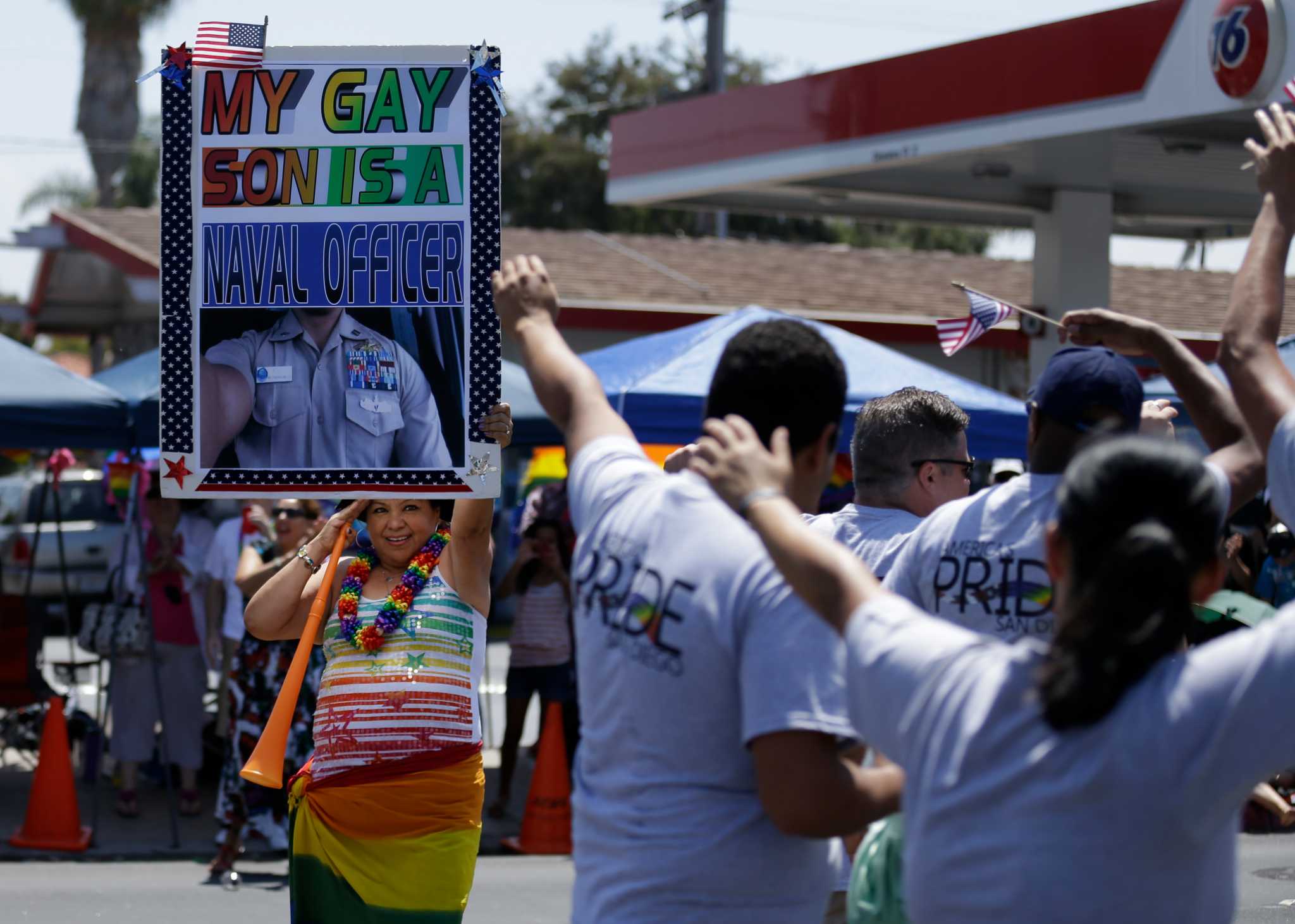 US military members march in full uniform at San Diego gay pride