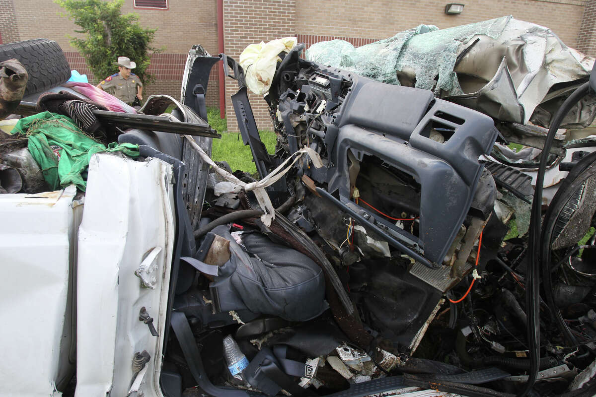 This is what's left of the cab of a 2000 Ford F-250 pickup truck after it crashed into a tree on the side of U.S. Highway 59 between Goliad and Beeville, Texas before 7:00 p.m. Sunday July 22, 2012. Thirteen people died in the accident and the truck was carrying more than 20 people when the accident took place. The truck is currentlly at the Goliad Sheriff's Office in Goliad, Texas. John Davenport/© San Antonio Express-News