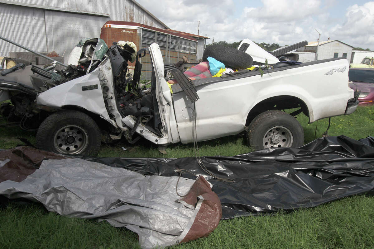 This is what's left of a 2000 Ford F-250 pickup truck after it crashed into a tree on the side of U.S. Highway 59 between Goliad and Beeville, Texas before 7:00 p.m. Sunday July 22, 2012. Thirteen people died in the accident and the truck was carrying more than 20 people when the accident took place. The truck is currentlly at the Goliad Sheriff's Office in Goliad, Texas. John Davenport/© San Antonio Express-News