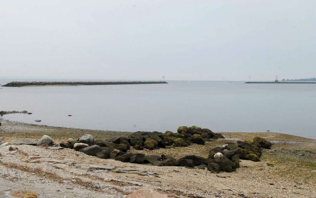 The eastwall (on left ) of Stamford (Conn.) Harbor on Monday July 23, 2012 where firefighter Keith Morris of New Rochelle, N.Y. was killed when his boat crashed and flipped.