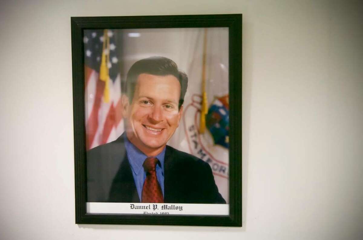 A portrait hangs in a hallway as Stamford Mayor Dannel Malloy leaves his office on the tenth floor of the government center for the last time on Monday, Nov. 30, 2009. Michael Pavia is scheduled to be sworn in at his home at midnight.