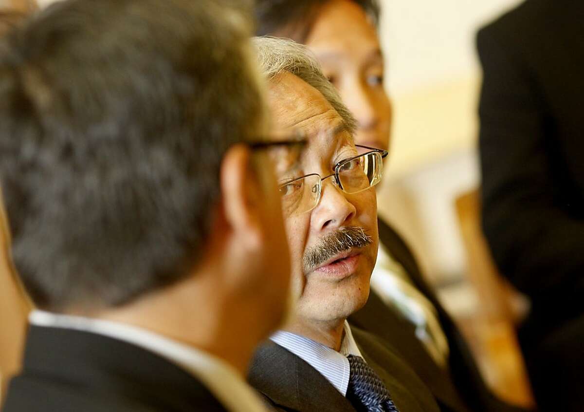 Mayor Ed Lee glanced at Supervisor John Avalos (left) while answering a question about the tax plan. Board President David Chiu is at right. San Francisco Mayor Ed Lee has reached a compromise with Supervisor John Avalos and business groups in a grand compromise to overhaul the city's business tax while also generating $13 million for affordable housing and over $15 million for the general fund.