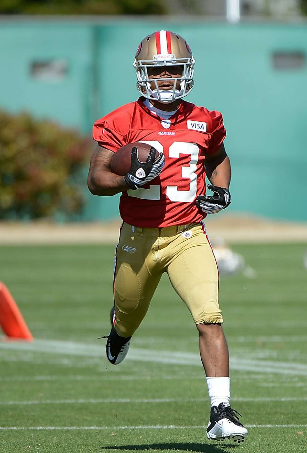 SANTA CLARA, CA - MAY 11: LaMichael James #23 of the San Francisco 49ers carries the ball up field during Rookie Minincamp at the San Francisco 49ers practice facility on May 11, 2012 in Santa Clara, California. (Photo by Thearon W. Henderson/Getty Images)