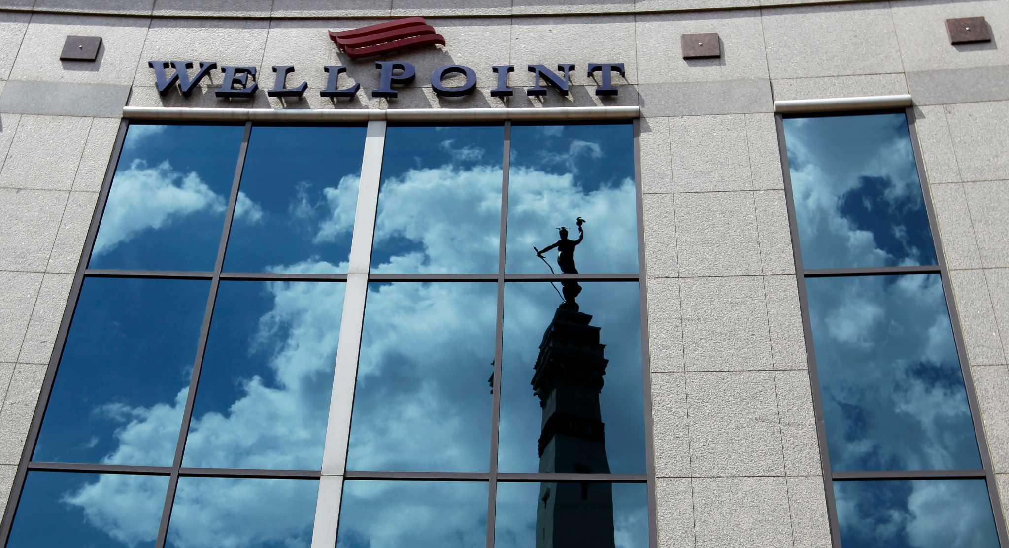 WellPoint lowers forecast after loss