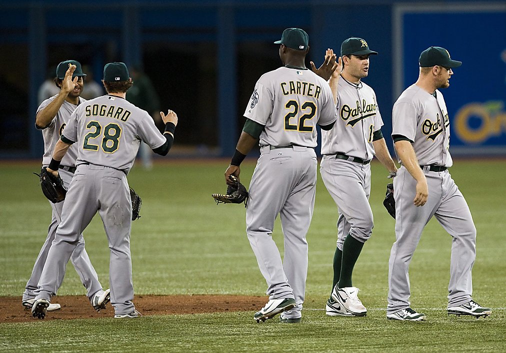 'Spiderman' Reddick helps A's toast Jays