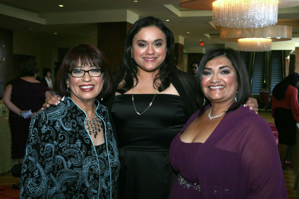 OTS/HEIDBRINK - Honoree Jessie Degollado, from left, trichair woman Rachel Benavidez and president elect Nora Lopez gather at the San Antonio Association of Hispanic Journalists awards gala at the Grand Hyatt Hotel on 7/20/2012. This is #3 of 3 photos. names checked photo by leland a. outz