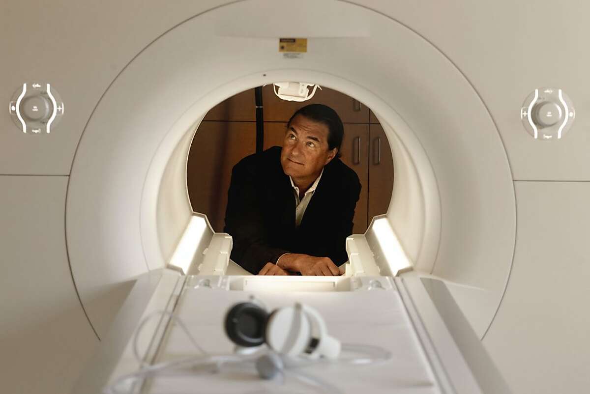 Dr. Michael Weiner, director of the San Francisco Vetrans Affairs medical center, for imaging of Neurodegenerative Diseases, with the center's, 3 Tesla Siemens Skyra MRI scanner, at the hospital in San Francisco, Ca., on Tuesday July 24 2012. The imaging capabilities at the Veterans Health Research Institute, make it possible for the VA center to do leading research on Alzheimer's, aging veterans and Post Traumatic Stress Disorder.