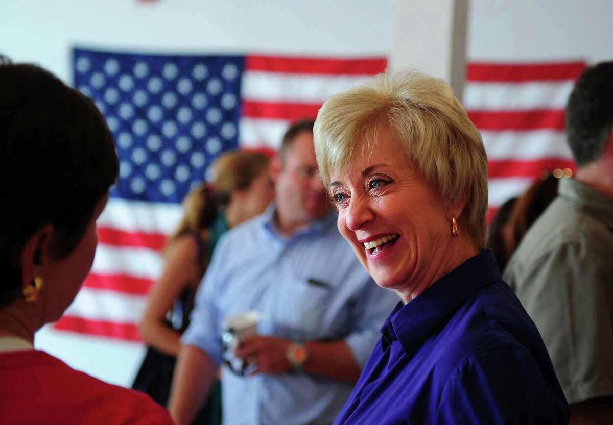 Republican U.S. Senate candidate Linda McMahon talks with state Rep. Livvy Floren, R-149th District, at the campaign's Norwalk field office July 14, 2012, during her "Super Saturday" blitz, an outreach initiative with the goal of making 10,000 phone calls and knocking on 10,000 doors in a single day.