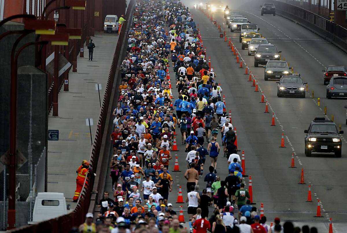 A view from Vista Point as runners made their way across the Golden Gate Bridge. The annual San Francisco Marathon starts and ends on the Embarcadero. Marathon runners also ran across a foggy Golden Gate Bridge Sunday July 29, 2012.