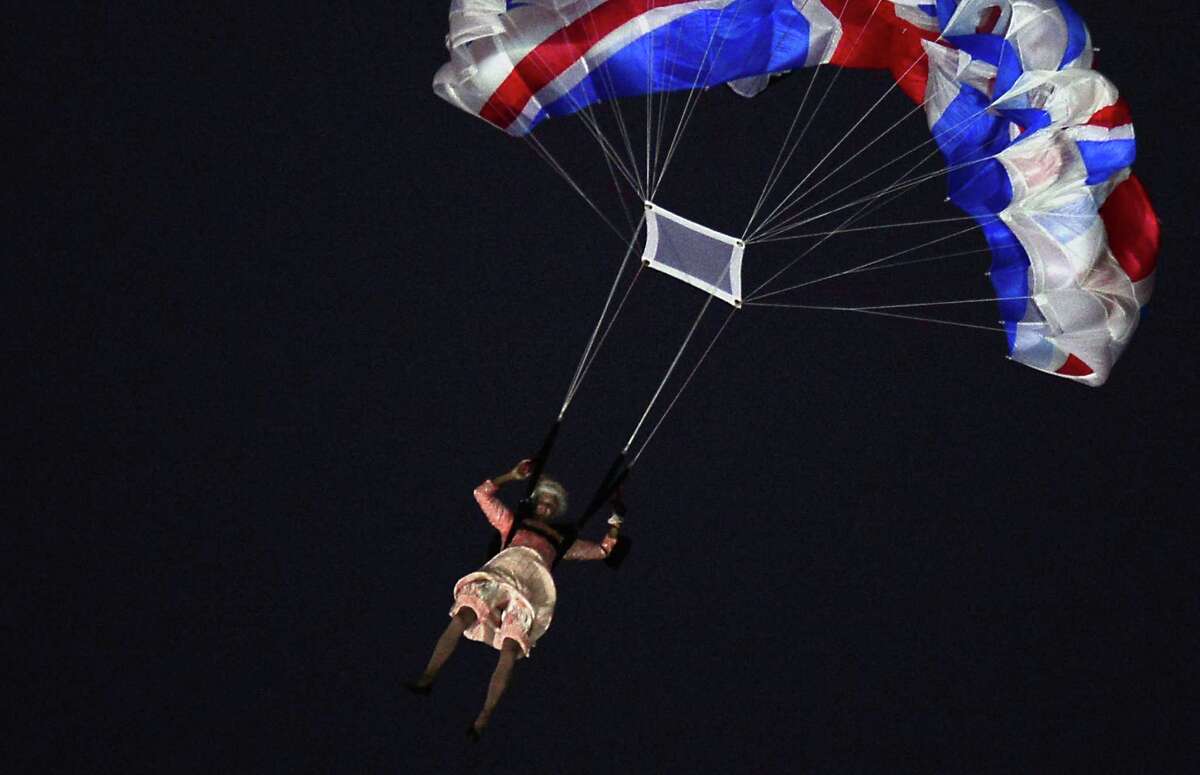 An actor dressed to resemble Britain's Queen Elizabeth II parachutes into the stadium during the opening ceremony of the London 2012 Olympic Games at the Olympic Stadium in London on July 27, 2012. Read more about the actor who played the queen here. AFP PHOTO / OLIVIER MORINOLIVIER MORIN/AFP/GettyImages