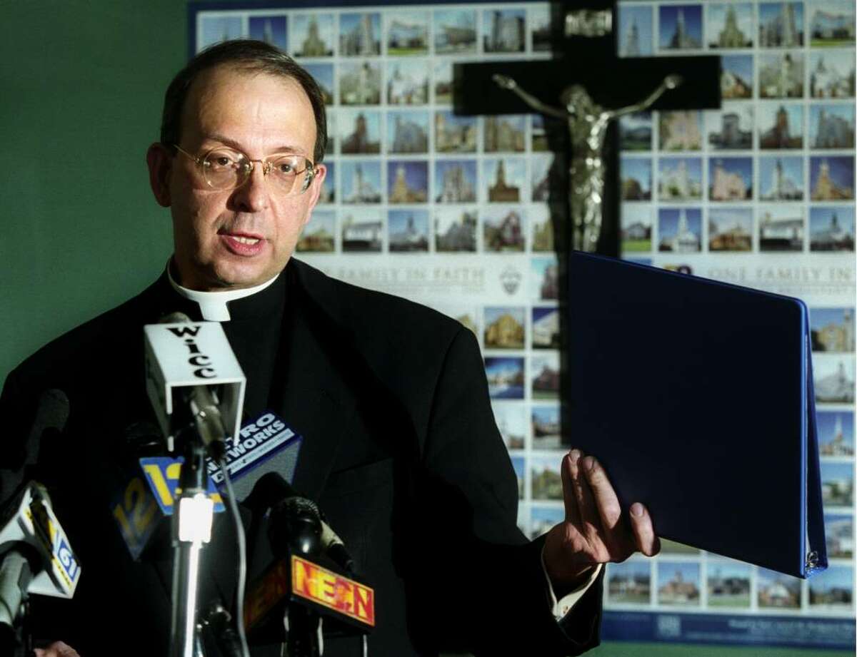 Bishop Lori speaks during a press conference at the Catholic Center in Bridgeport on October 16, 2003