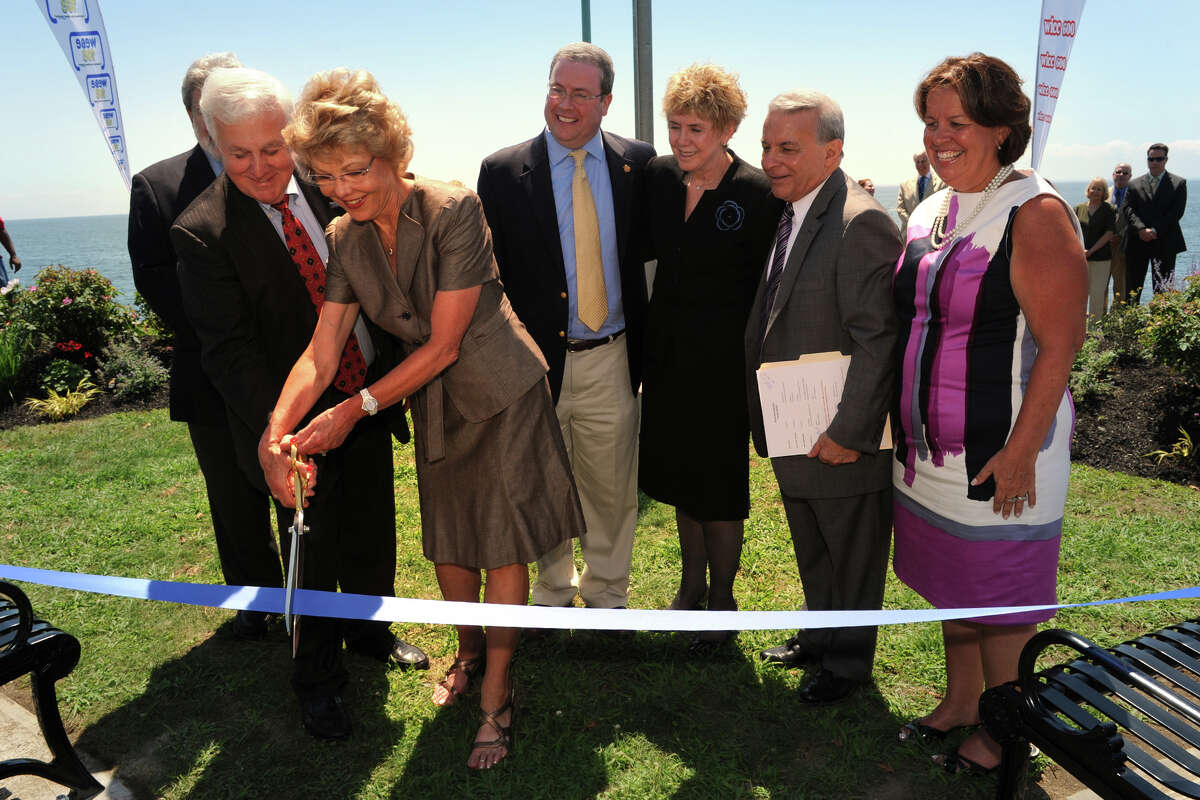 Ronald J. Bianchi and his wife Lynette, cut the ribbon during the dedication ceremony for "Bianchi Way" in Bridgeport, Conn. July 30th, 2012. A section of St. MaryâÄôs By the Sea has been dedicated in honor of the longtime St. VincentâÄôs administrator.