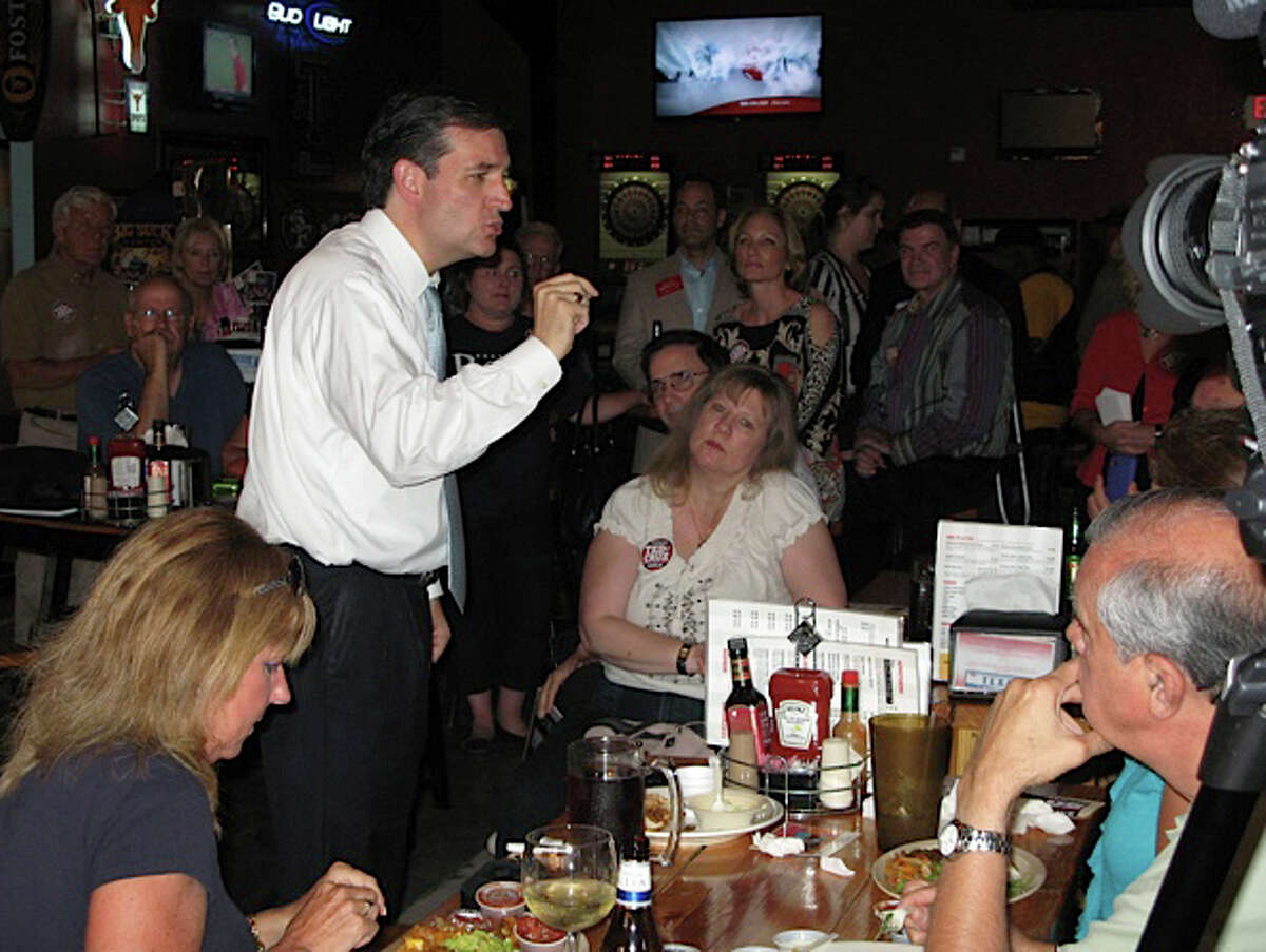 GOP U.S. Senate candidate Ted Cruz rallies supporters during his final campaign stop in San Antonio before Tuesday’s runoff election with Lt. Gov. David Dewhurst. Cruz spoke to more than 100 Republicans and tea party members Wednesday night July 25 at Sideliners Grill, made a passionate plea for votes and money.