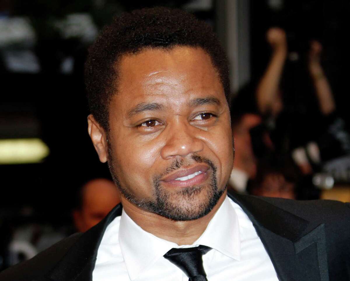FILE - This May 25, 2012 file photo shows actor Cuba Gooding Jr arriving for the screening of "Cosmopolis" at the 65th international film festival, in Cannes, southern France. New Orleans police say an arrest warrant has been issued on a municipal battery charge for actor Cuba Gooding after an incident Tuesday, July 31, at a New Orleans bar. Gooding was in New Orleans filming. (AP Photo/Joel Ryan, file)