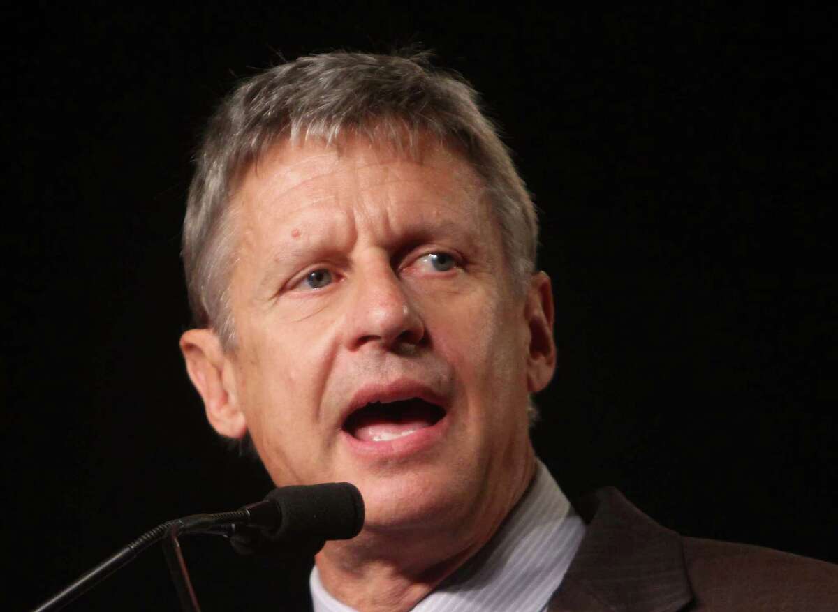 In this Sept 23, 2011 file photo, Libertarian Party presidential candidate, former New Mexico Gov. Gary Johnson speaks in Orlando, Fla. President Barack Obama's presidential campaign is paying close attention to two candidates mounting third party campaigns for the presidency, believing they could draw votes from rival Mitt Romney and help the president to victory in a few tightly contested states.