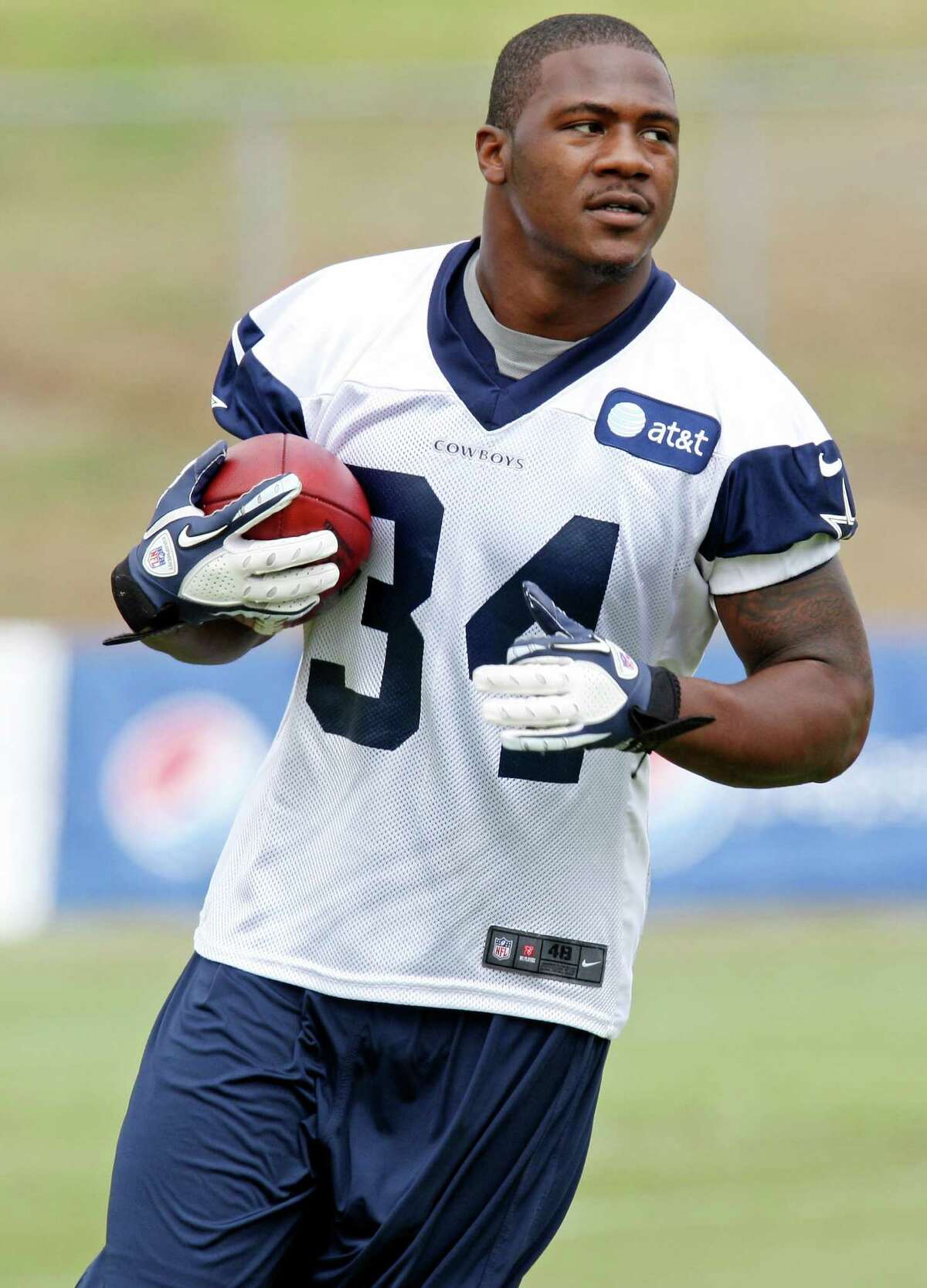 Dallas Cowboys running back Phillip Tanner runs a play during 2012 training camp held Tuesday July 31, 2012 in Oxnard, CA.