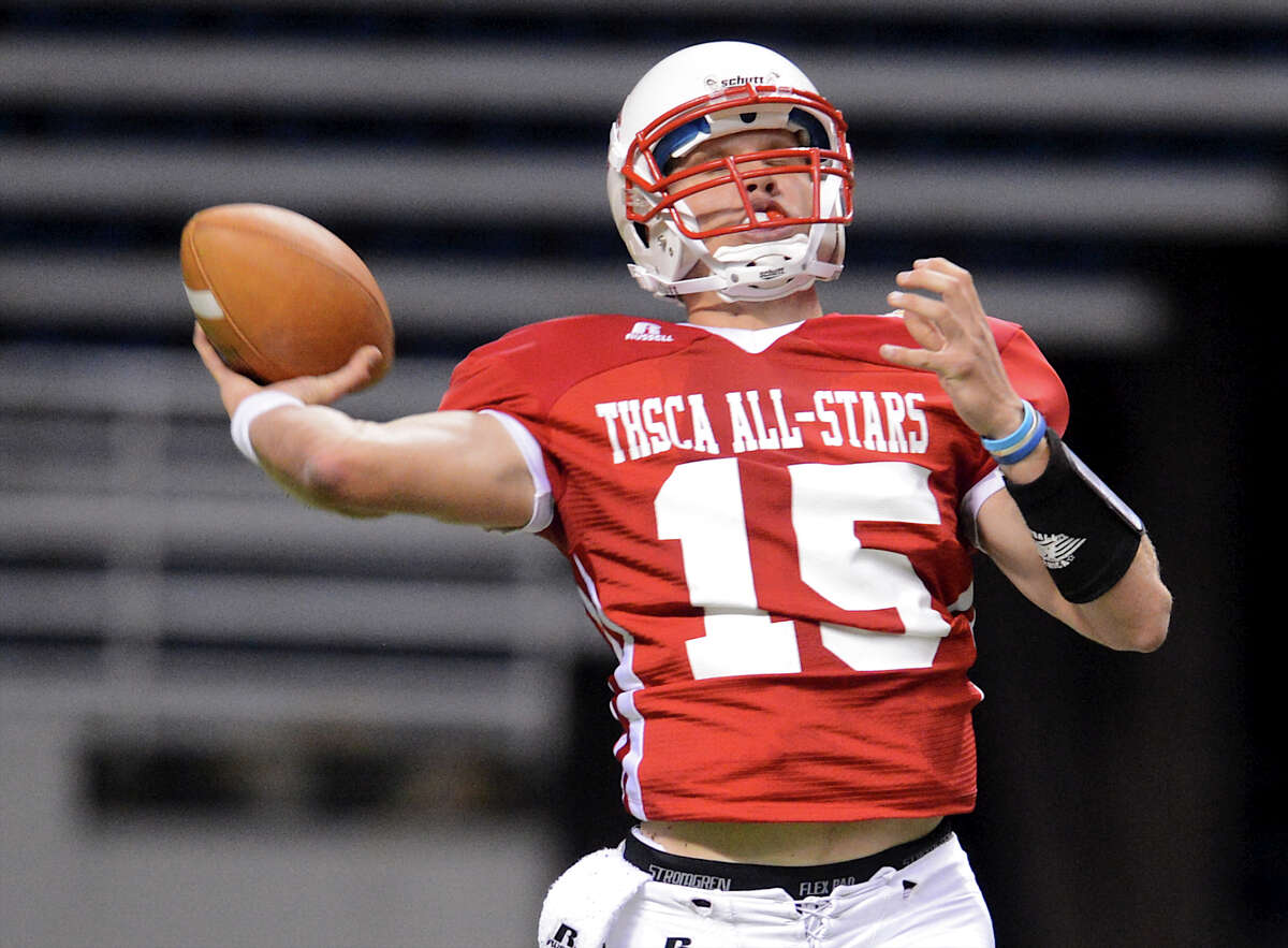 Warren quarterback Rex Dausin (15) trows a pass during the 2012 Texas high school coaches association all-star football game on July 31, 2012 at the Alamodome.