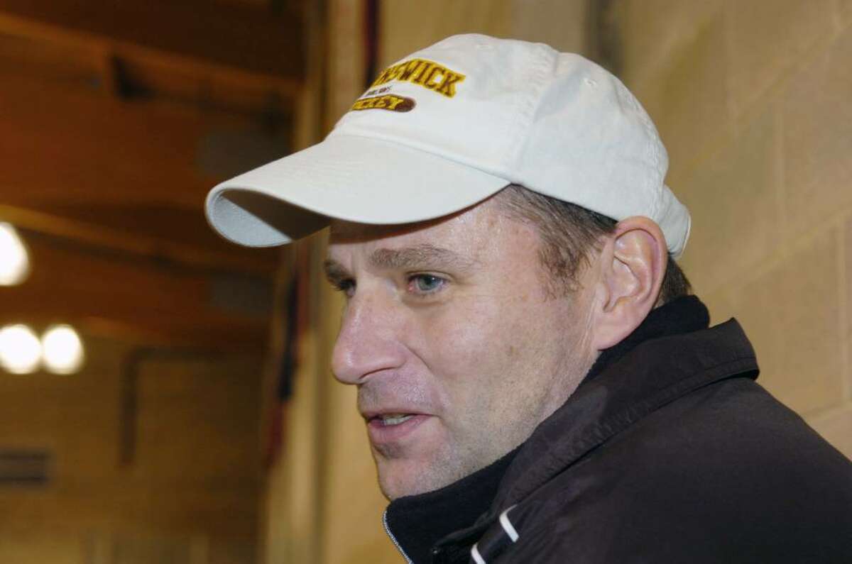 Bruins hockey coach Ron VanBelle discusses his team during practice at Brunswick's Hartong Rink Tuesday afternoon, Dec. 1, 2009.