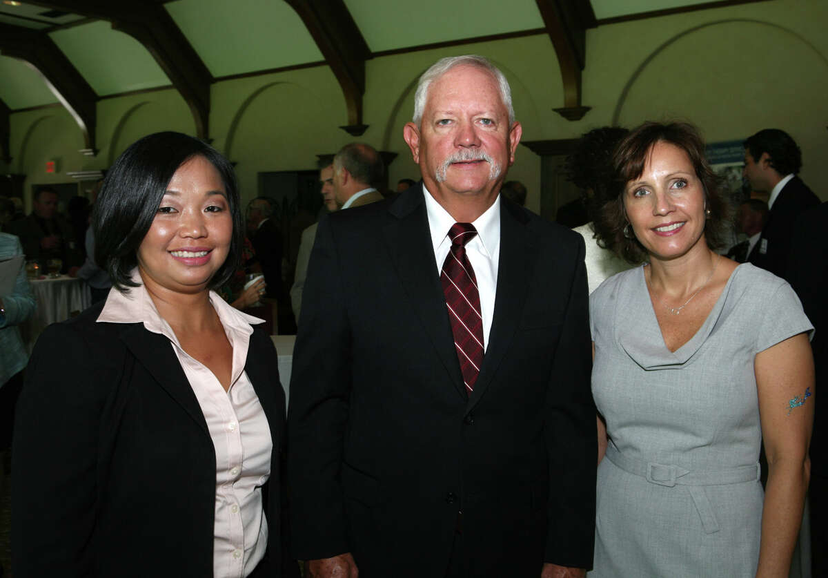 OTS/HEIDBRINK - Recipients Melinda Rodriguez, from left, Danny Williams and Mary Reilly-Magee gather at the North San Antonio Chamber of Commerce Small Business Leaders Awards luncheon at Oak Hills Country Club on 7/18/2012. This is #3 of 3 photos. names checked photo by leland a. outz
