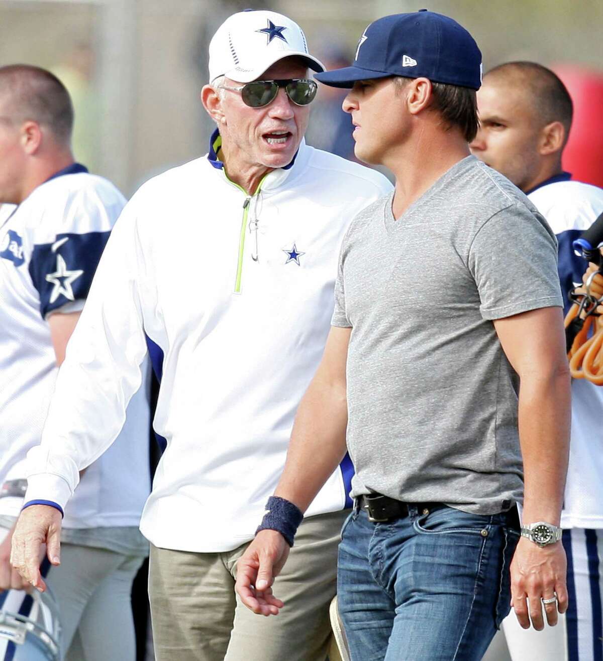 Dallas Cowboys owner Jerry Jones (left) talks with actor George Eads during 2012 training camp held Wednesday Aug 1, 2012 in Oxnard, CA.