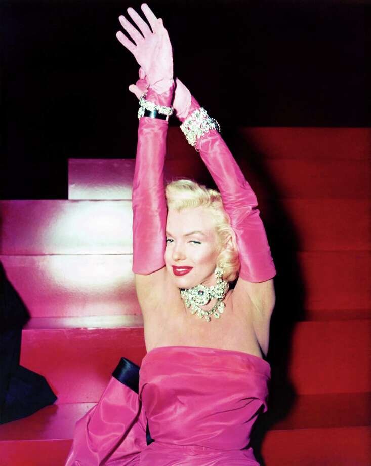 Marilyn Monroe, already a film and cultural icon, emerges as fashion ...