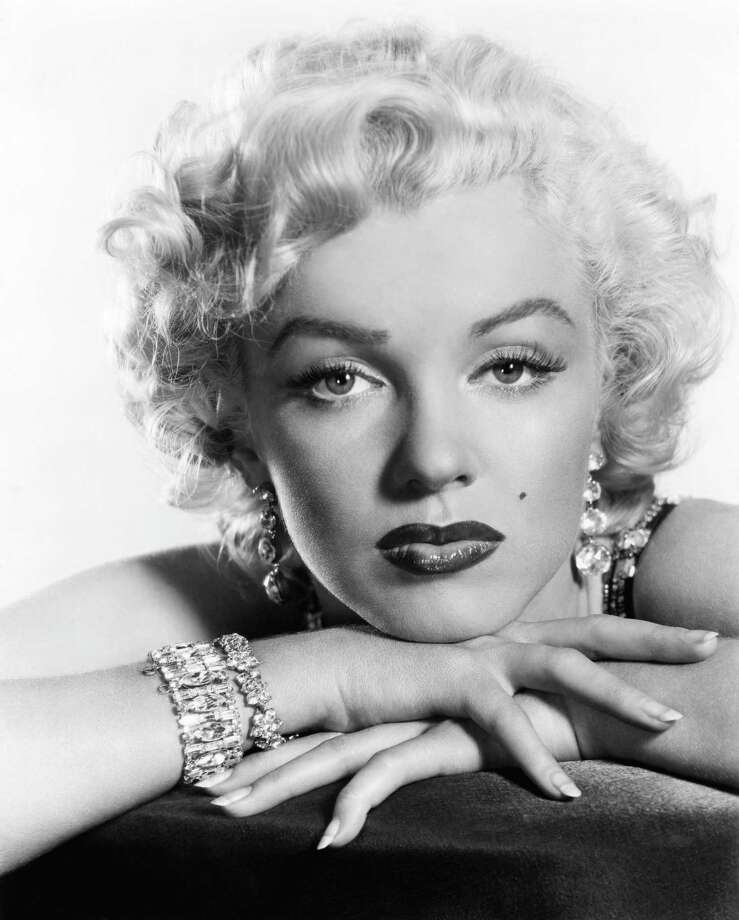 Marilyn Monroe, already a film and cultural icon, emerges as fashion ...