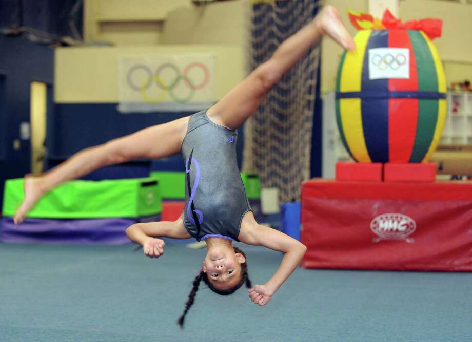 Young gymnasts yearn to be surprised at who wins Connecticut Post