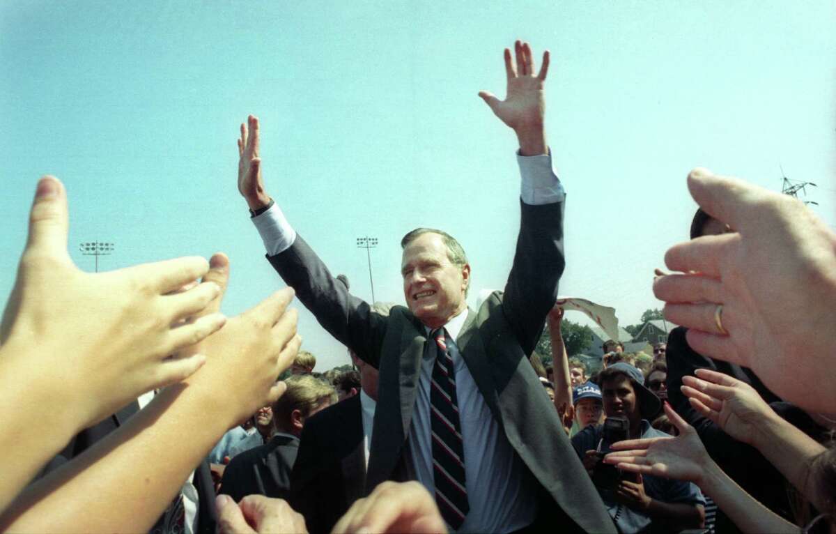 1992: President George Bush greets the crowd gathered at Nolan Field in Ansonia, Conn. Aug. 24th, 1992.