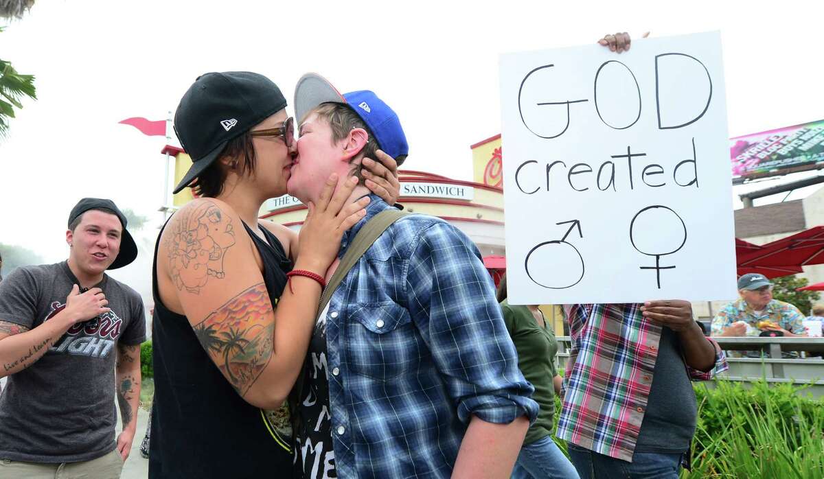 Same Sex Couples Kiss In Protest At Chick Fil A