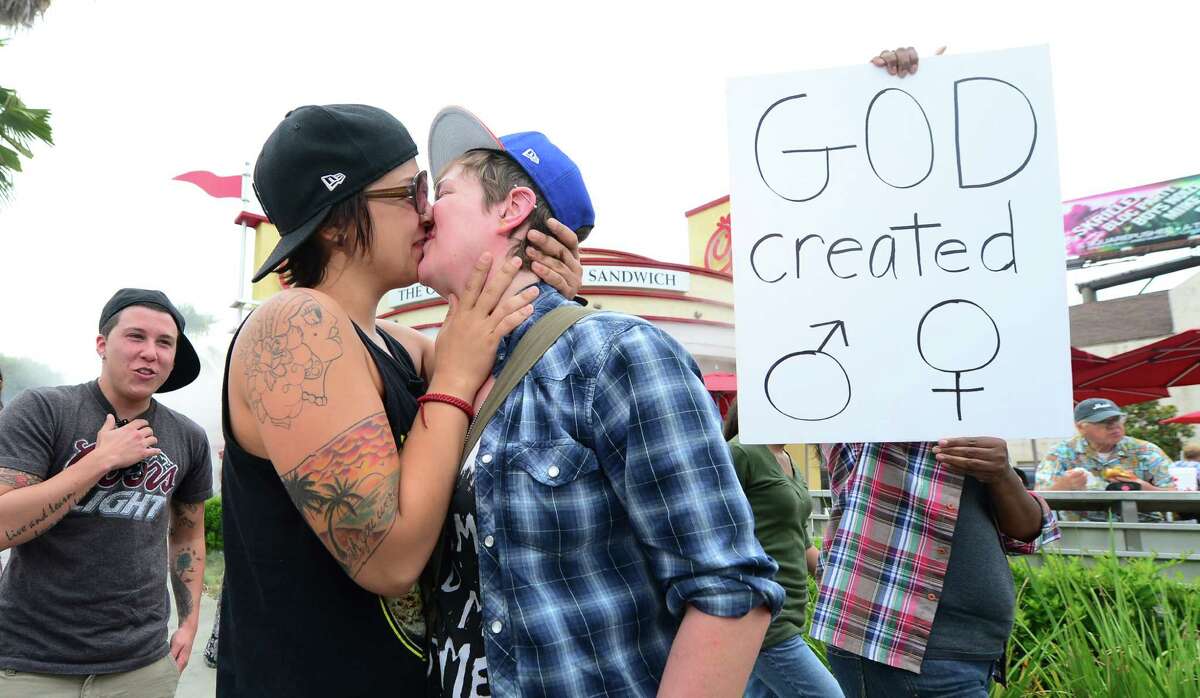 Same Sex Couples Kiss In Protest At Chick Fil A 