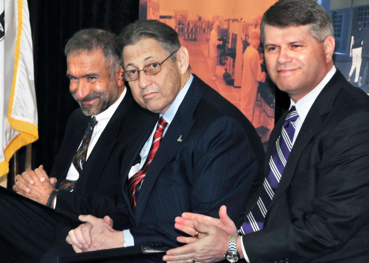 Rick Whitney, the CEO of M+W Group's U.S. operations, with Assembly Speaker Sheldon Silver, center, and Alain Kaloyeros, CEO of the University at Albany's College of Nanoscale Science and Engineering. Silver helped secure $6 million to help M+W move to the Watervliet Arsenal from Texas. M+W pledged to spend $229 million. File photo.