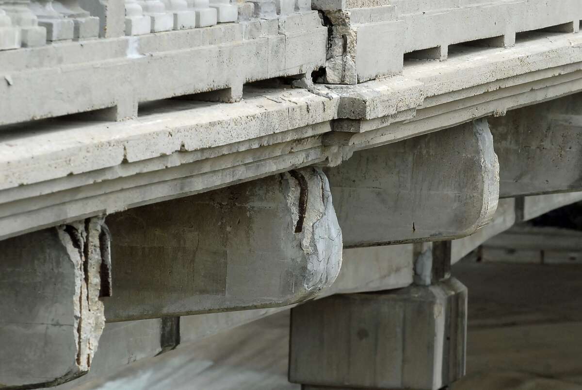 Exposed rods and deteriorating concete betray the age of the Yale Street Bridge, built in 1931.