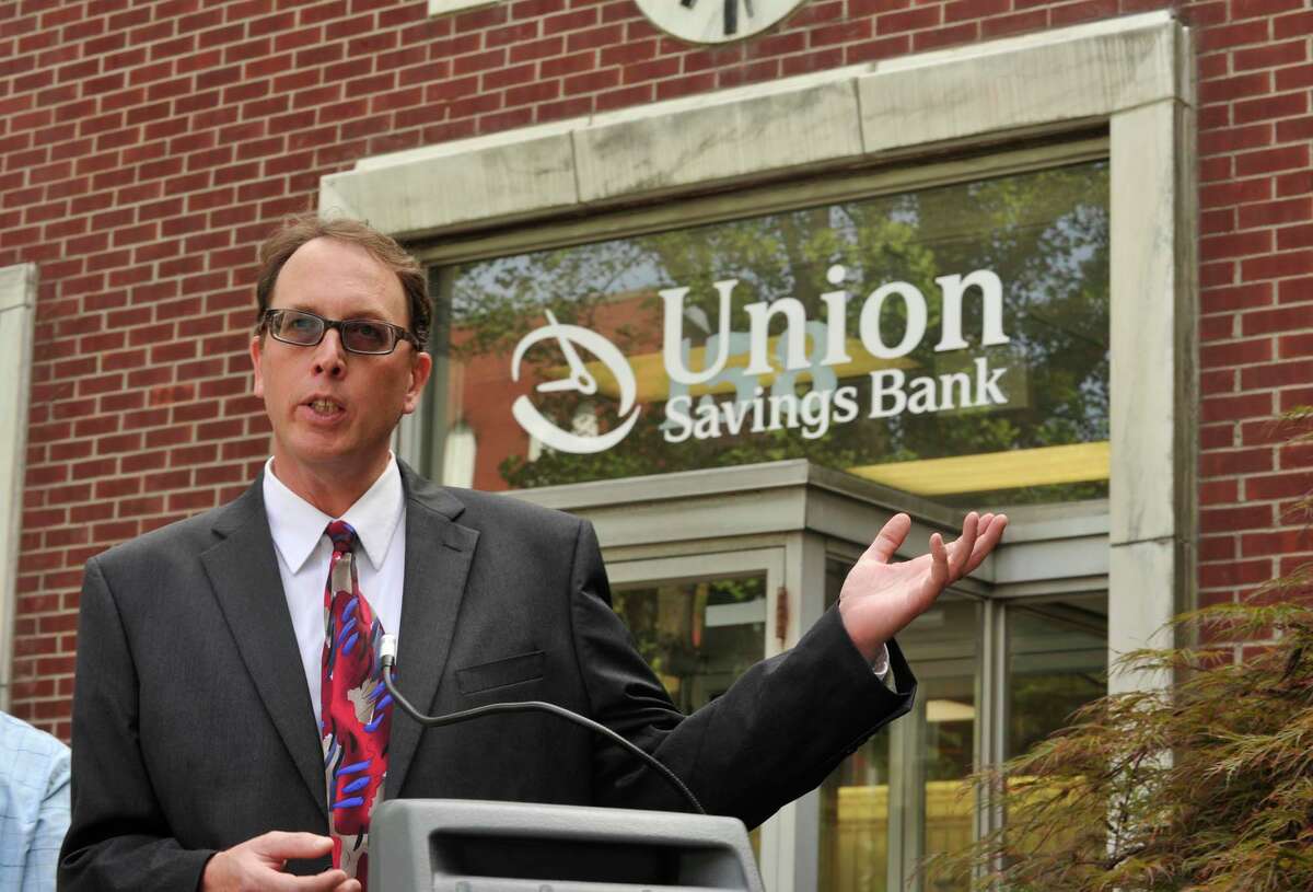 Mike Kaltschnee speaks during the announcement of the Danbury Innovation Center in front of Union Savings Bank on Main Street on Tuesday, Aug. 7, 2012. Kaltschnee and Jon Gatrell, not pictured, presented the idea of the center to city officials.