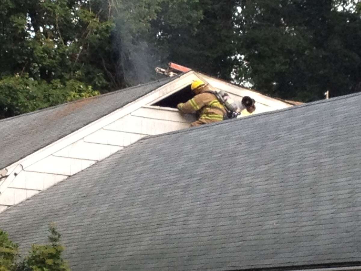 Stamford firefighters respond to a fire at 66 West View Lane the morning of Wednesday, Aug. 8, 2012.