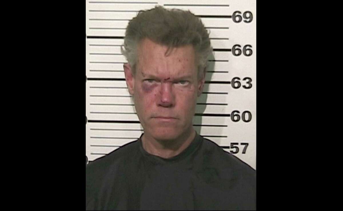 This photo provided by the Grayson County, Texas, Sheriff?’s Office shows Country singer Randy Travis who has been charged with driving while intoxicated. Authorities say Travis was being jailed without bond Wednesday, Aug. 8, 2012, pending an appearance before a judge in Sherman, Texas, about 60 miles north of Dallas. (AP Photo/Grayson County Sheriff's Office)