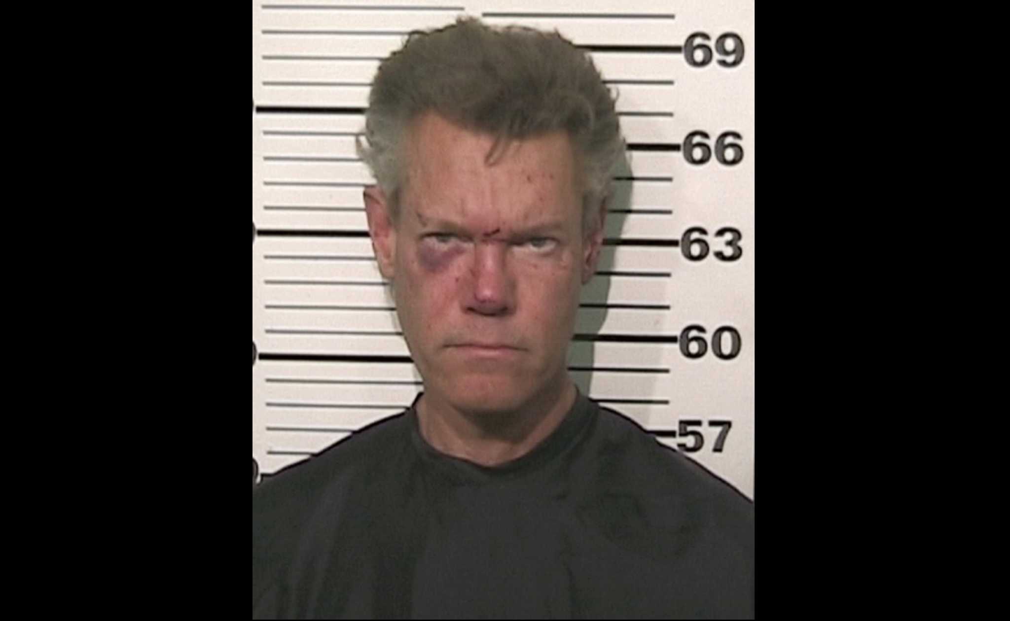 Randy Travis arrested naked, charged with DWI