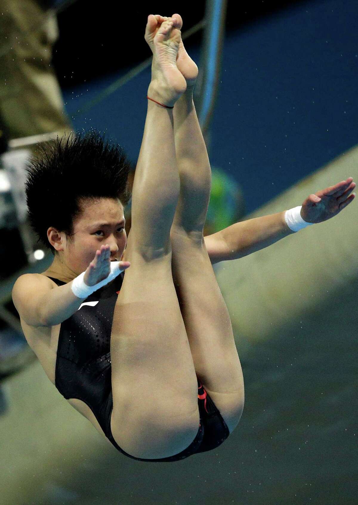 Chen Ruolin from China competes during the women's 10-meter platform diving preliminaries at the Aquatics Centre in the Olympic Park during the 2012 Summer Olympics in London, Wednesday, Aug. 8, 2012.