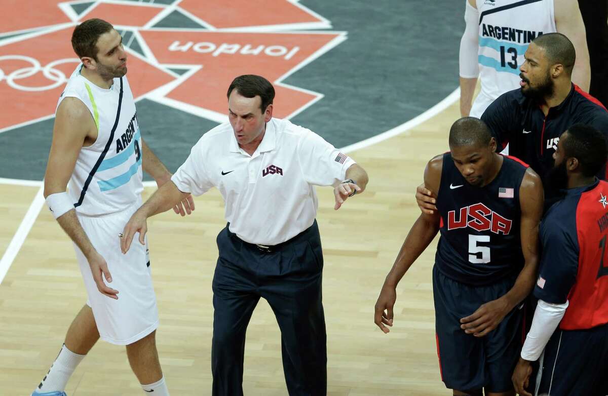 United States coach Mike Krzyzewski (center) had to keep the peace during the Americans’ game against Argentina in the preliminary round. The teams meet again today in the semifinals.