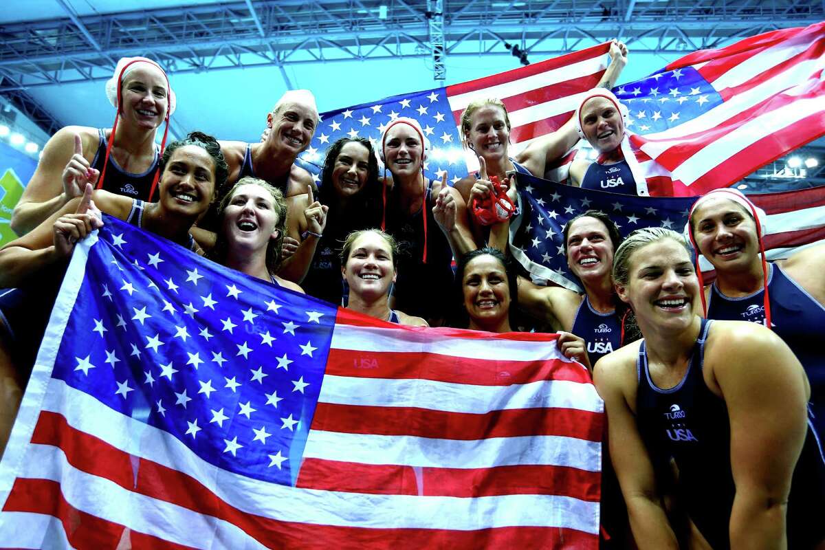 LONDON, ENGLAND - AUGUST 09: United States players celebrate winning the Women's Water Polo Gold Medal match between the United States and Spain on Day 13 of the London 2012 Olympic Games at the Water Polo Arena on August 9, 2012 in London, England.