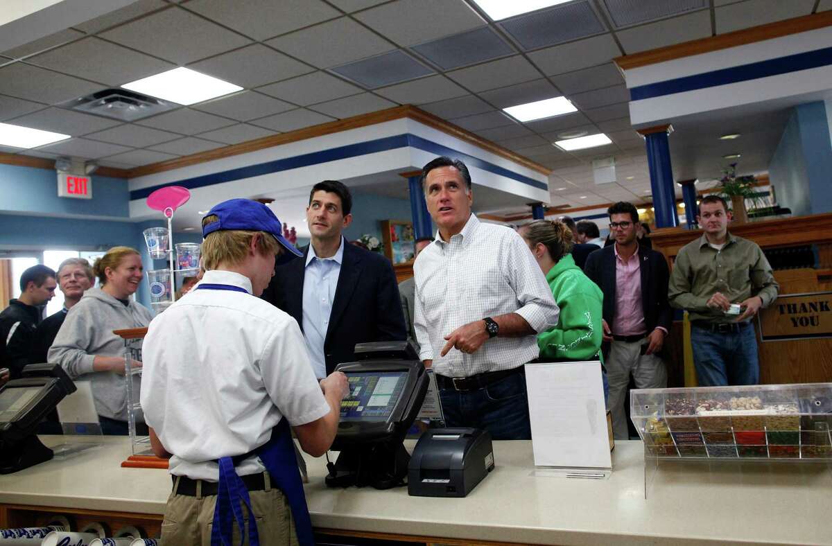 FILE -- Mitt Romney, the presumed Republican presidential nominee, and Rep. Paul Ryan (R-Wis.) order food at a Culver's restaurant in Johnson Creek, Wis., April 1, 2012. Conservatives are increasing the pressure on Romney to pick Ryan as his running mate.