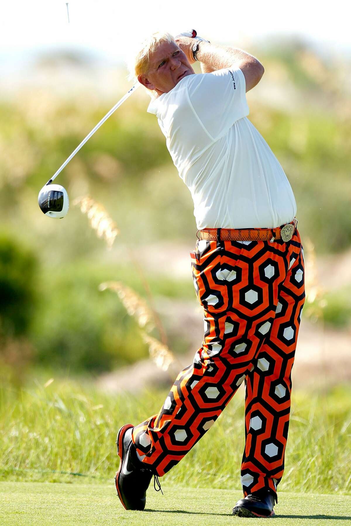 John Daly of the United States hits off the sixth tee during Round One of the 94th PGA Championship at the Ocean Course on August 9, 2012 in Kiawah Island, South Carolina. (Jonathan Ferrey / Getty Images)
