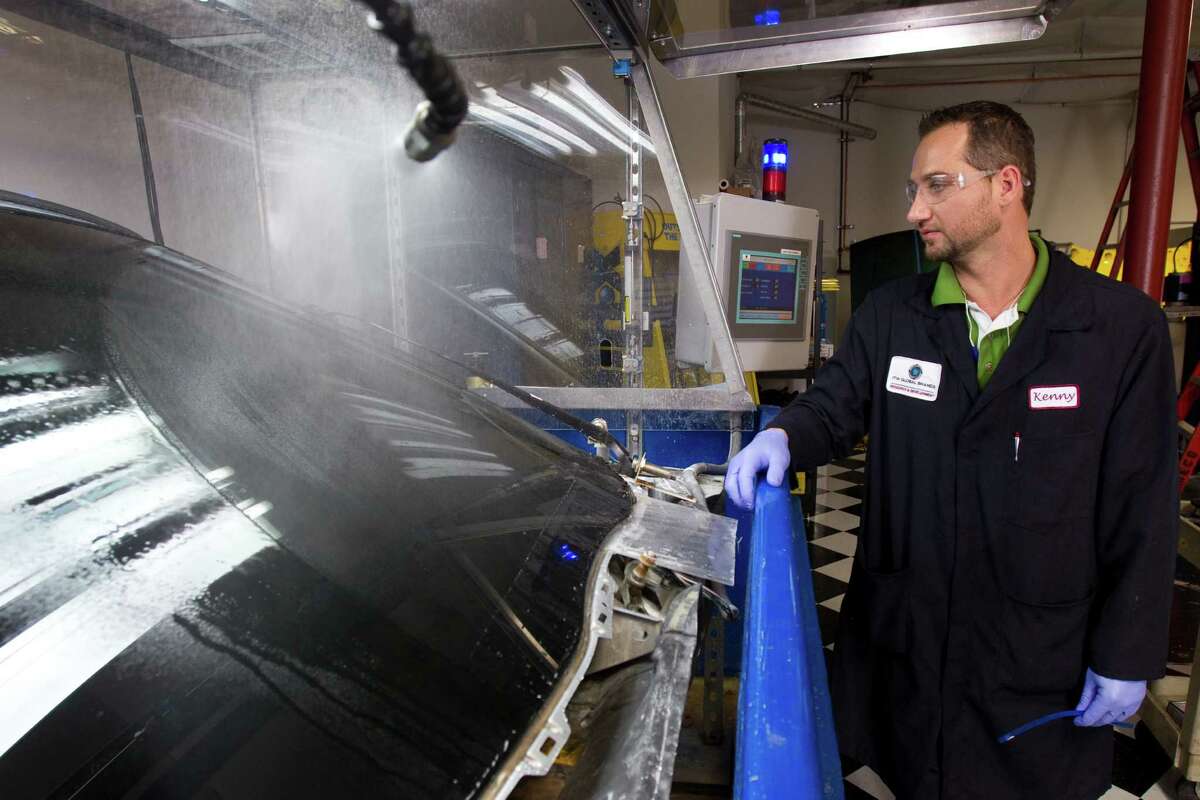 Kenny Teal, senior R&D associate, tests wiper blades at ITW Global Brands Wednesday, July 11, 2012, in Houston. ITW makes innovative products for automobile appearance and performance.