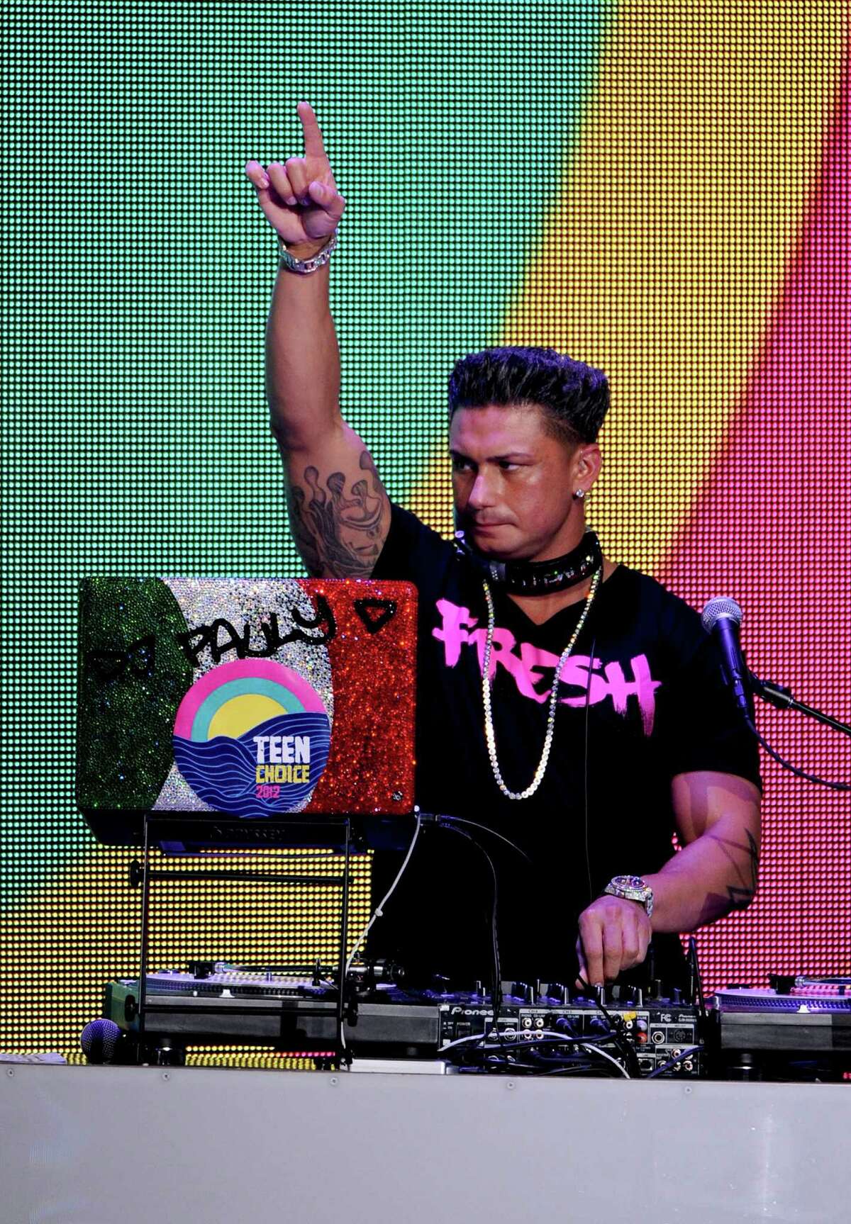 UNIVERSAL CITY, CA - JULY 22: DJ Pauly D spins onstage during the 2012 Teen Choice Awards at Gibson Amphitheatre on July 22, 2012 in Universal City, California.