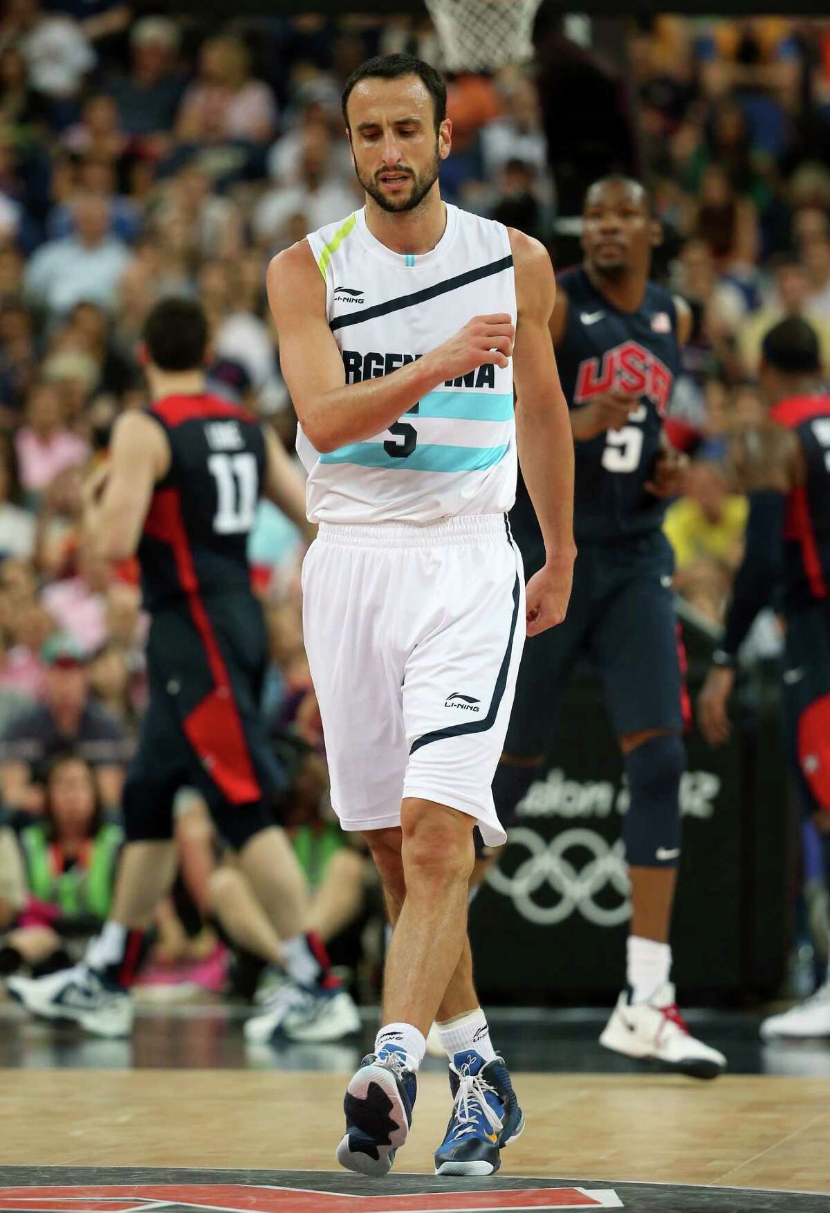 LONDON, ENGLAND - AUGUST 10: Manu Ginobili #5 of Argentina reacts in the second half while taking on the United States during the Men's Basketball semifinal match on Day 14 of the London 2012 Olympic Games at the North Greenwich Arena on August 10, 2012 in London, England.