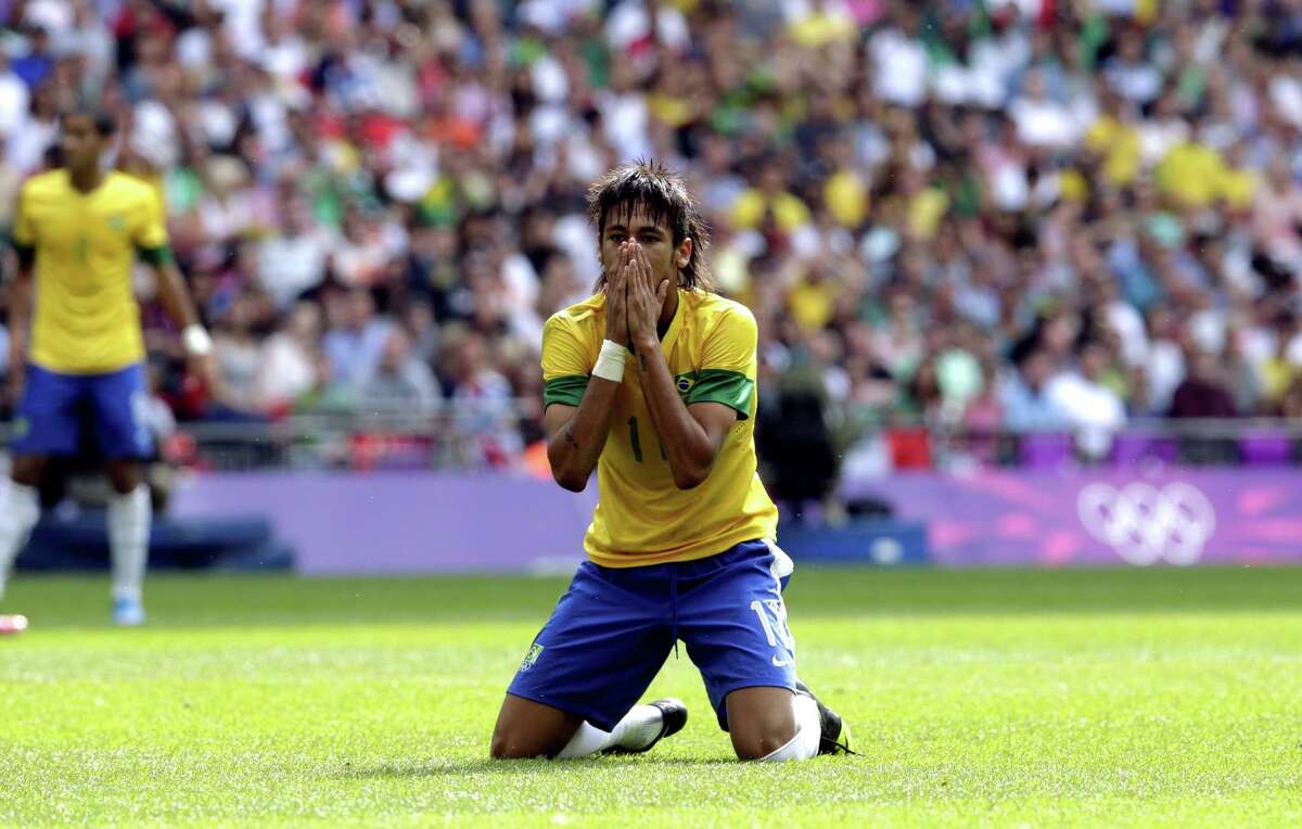 Brazil's Neymar reacts during the men's soccer final against Mexico at the 2012 Summer Olympics, Saturday, Aug. 11, 2012, in London. (AP Photo/Luca Bruno)