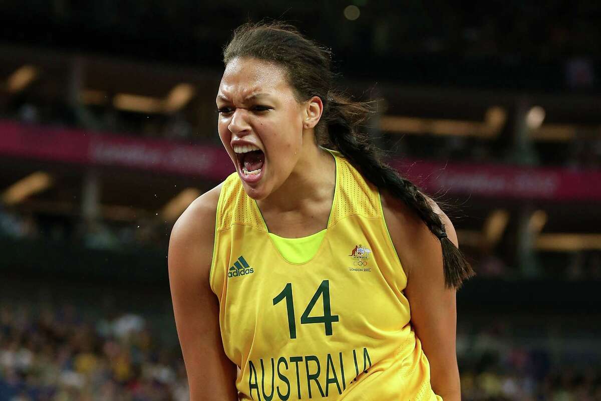 LONDON, ENGLAND - AUGUST 11: Liz Cambage #14 of Australia reacts in the first half against Russia during the Women's Basketball Bronze Medal game on Day 15 of the London 2012 Olympic Games at North Greenwich Arena on August 11, 2012 in London, England.